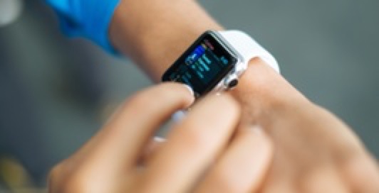 person checking smart watch